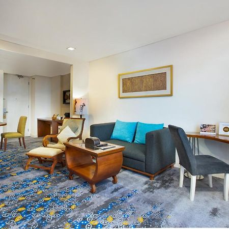 فندق جامبولوك ماليوبورو يوجياكارتا يوغياكارتا المظهر الخارجي الصورة A living room in a typical apartment